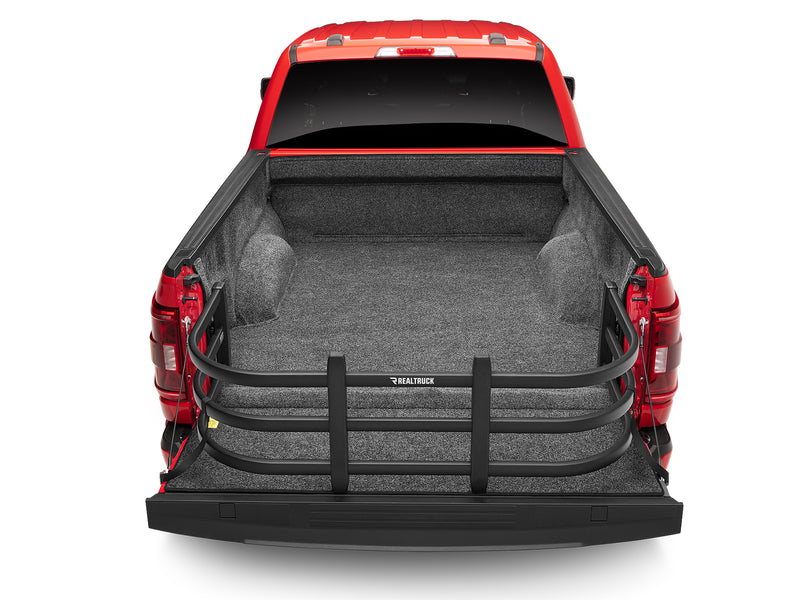 Overhead rear view of an empty pickup bed with the BedXTender HD Max extended over the lowered tailgate