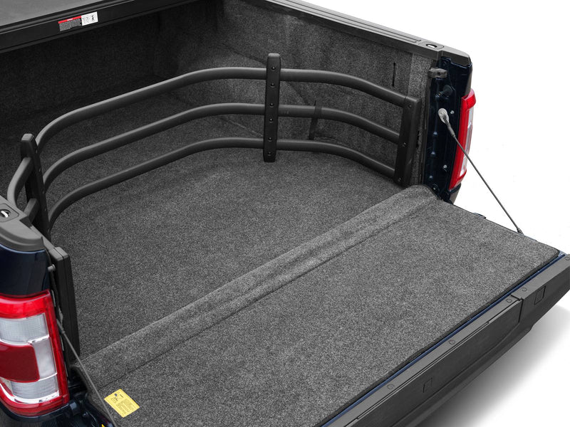 Inside view of the BedXTender HD Sport extended across a lowered, carpeted tailgate