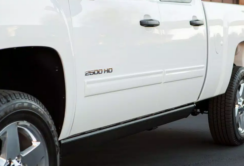 White heavy-duty pickup door panels with the running board tucked beneath, third angle