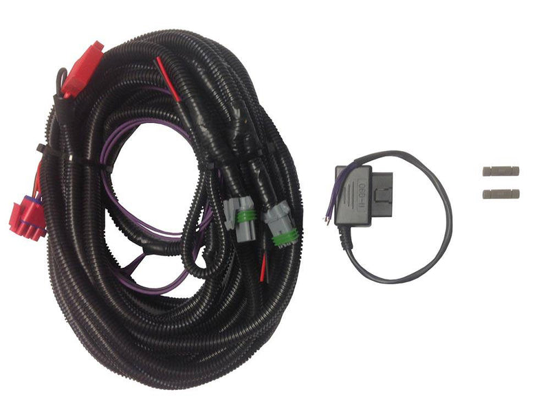 Plug-N-Play conversion kit on white: coiled wiring harness, OBD-II module and two butt splices