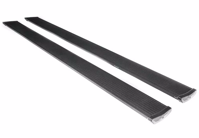 Pair of black PowerStep running boards on a white background