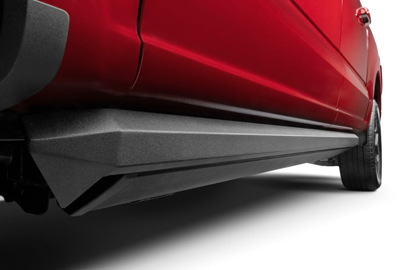 PowerStep XL stowed below the doors of a red pickup, low studio view