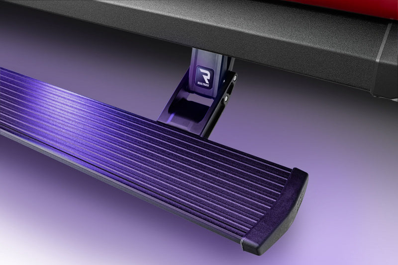 Close-up of the lit PowerStep XL step pad and linkage arm