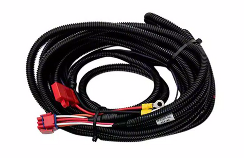 Coiled PowerStep wire harness with red and yellow connectors and ring terminal on white