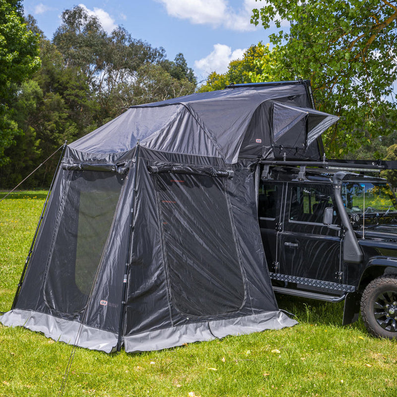 ARB Esperance V2 Annex 804200V2 erected in grey and black showing the mesh window panel, zippered door and grey floor skirt against a Defender