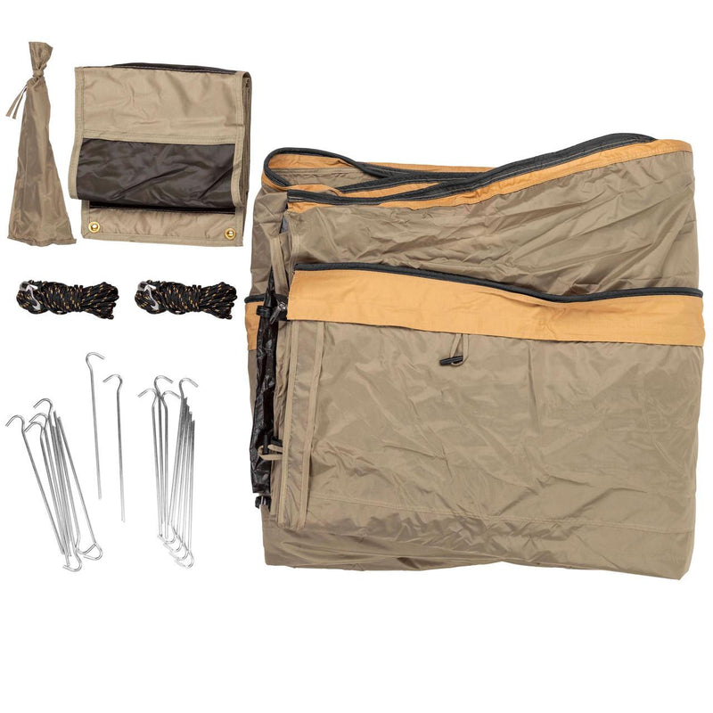 Complete contents of the ARB Deluxe Awning Room With Floor 813108A laid flat on white: folded greige walls, black floor, storage bag, two guy ropes and steel pegs
