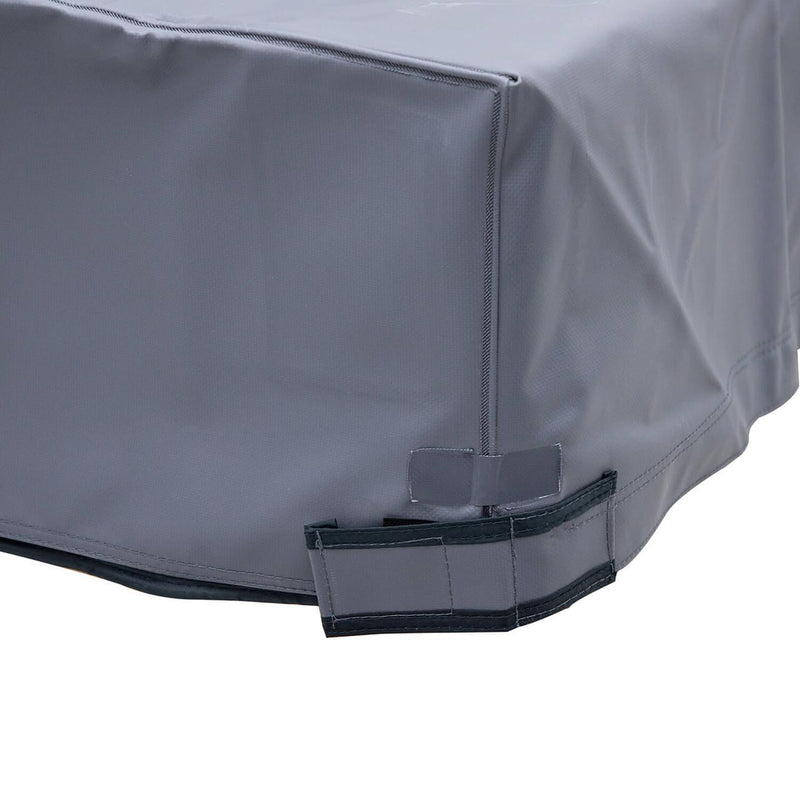 Corner detail of the ARB Rooftop Tent Cover 815100 showing the black-bound hem, hook-and-loop closure tab and reinforced strap pocket in the grey PVC skirt