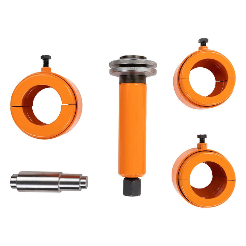 ARB 0770001 Air Locker bearing puller components laid out: three orange split bearing cups, the orange puller body with its knurled thrust bearing and hex drive, and the steel adapter shaft