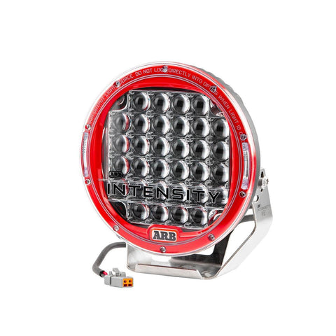 ARB Intensity V2 AR32FV2 driving light front view, red bezel ring around a clear lens packed with 32 square OSRAM LEDs in faceted flood reflectors, stainless bracket and Deutsch pigtail
