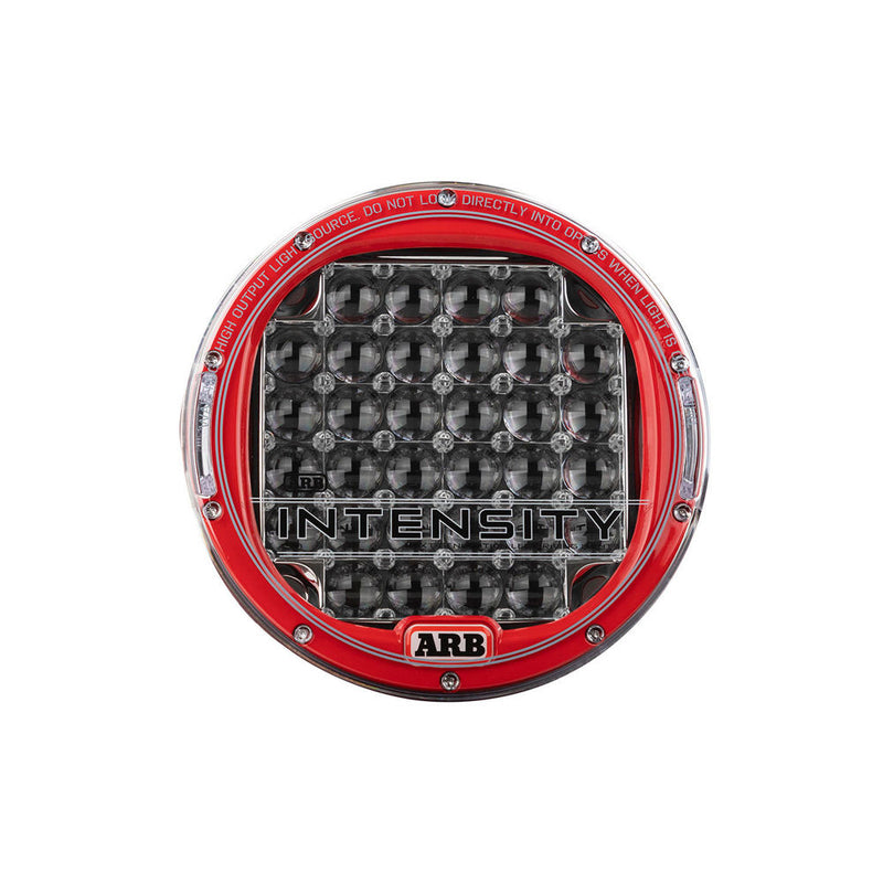 ARB Intensity V2 AR32SV2 driving light front view, red bezel around a clear lens with 32 OSRAM LEDs set in deep round HyperSpot reflector cups, stainless bracket and Deutsch pigtail