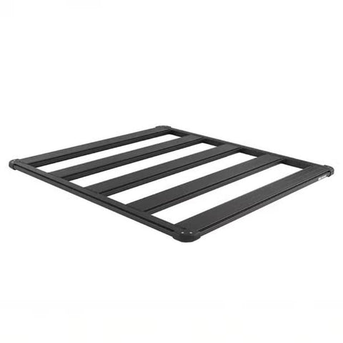 ARB BASE Rack aluminum roof rack platform on white, angled view of the compact five beam deck with perimeter dovetail rail