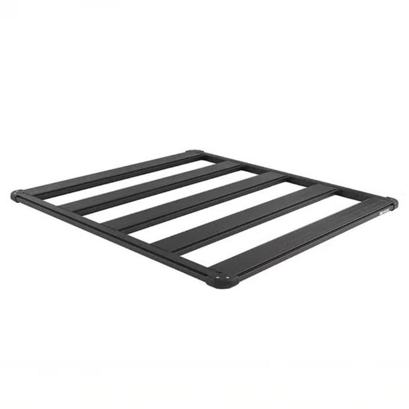 ARB BASE Rack aluminum roof rack platform on white, angled view of the compact five beam deck with perimeter dovetail rail