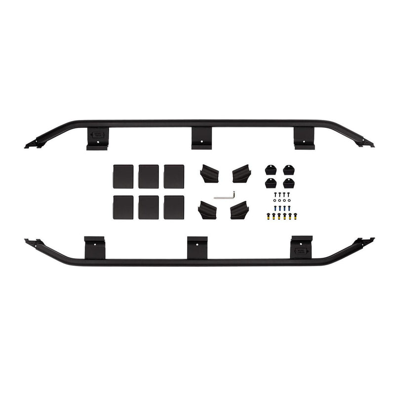 ARB BASE Rack trade guard rail kit laid out on white: two side rails, mounting brackets, pads and hardware