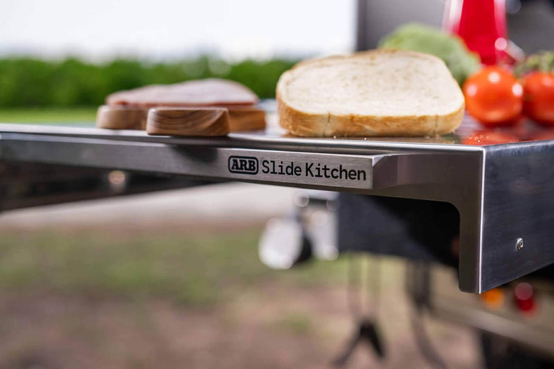 ARB Slide Kitchen worktop edge with logo, bread and tomatoes on the bench