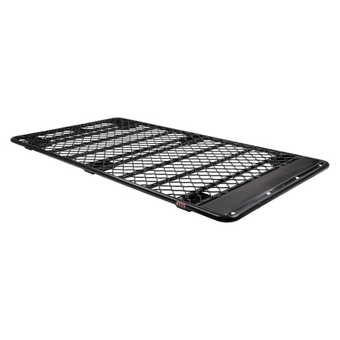 ARB Classic aluminum flat roof rack with a mesh floor on white, a long flat black platform with a diamond pattern mesh deck, no raised perimeter and a wind deflection panel at one end