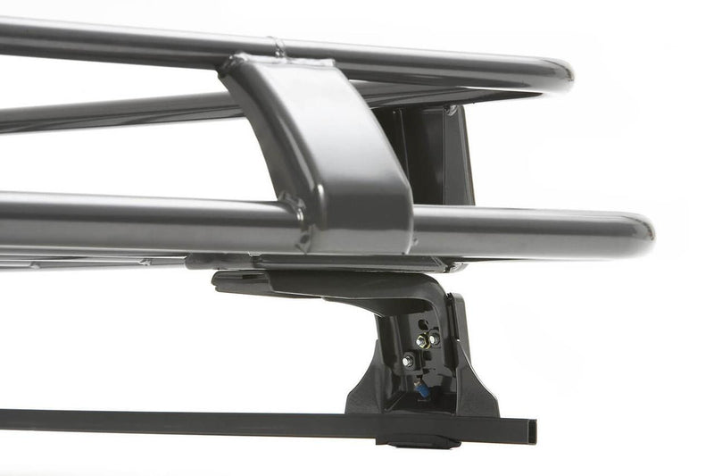 Close-up of an ARB Classic roof rack corner showing the rail clamp, ARB logo plate and gutter mounting leg on a load bar