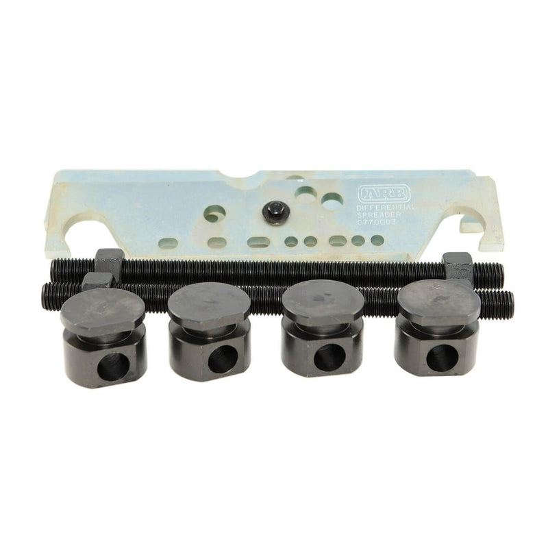 ARB 0770003 differential case spreader components: the zinc plated spreader plate embossed ARB DIFFERENTIAL SPREADER 0770003, two black threaded rods with nuts, and four black spreader blocks