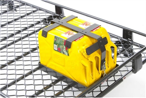 ARB double jerry can holder mounted on a mesh floored ARB Classic roof rack, holding two yellow 20 litre jerry cans clamped down by steel retention bars