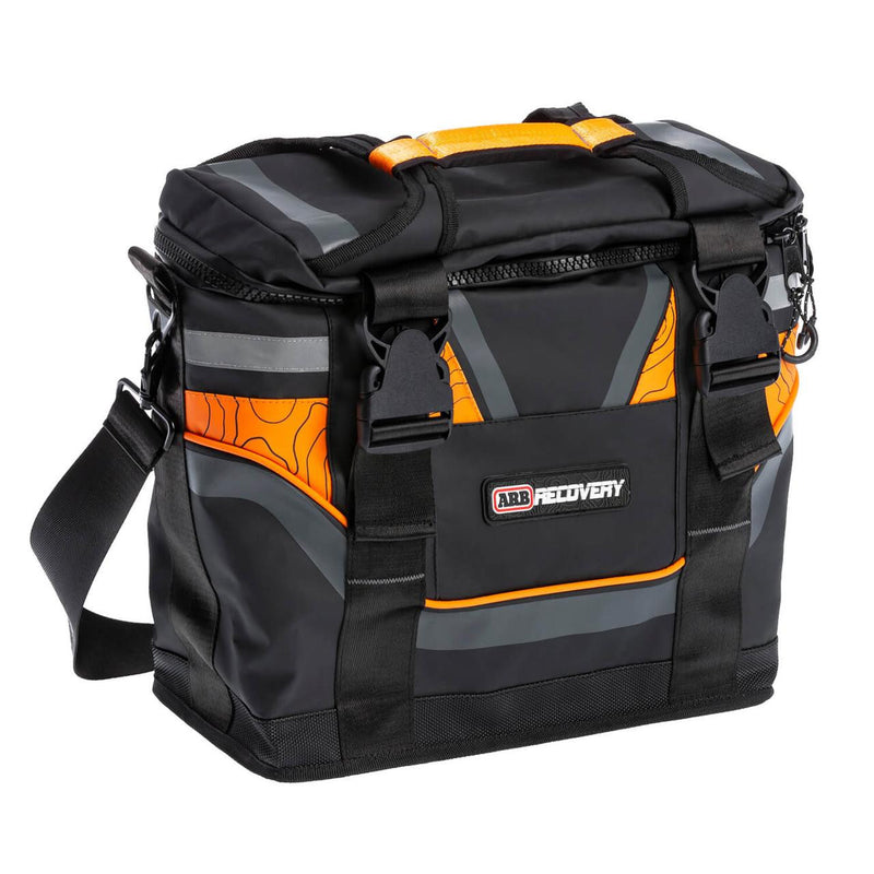 ARB small recovery bag from the Essentials Recovery Kit, black and orange with reflective strips and a detachable shoulder strap, shown closed on white