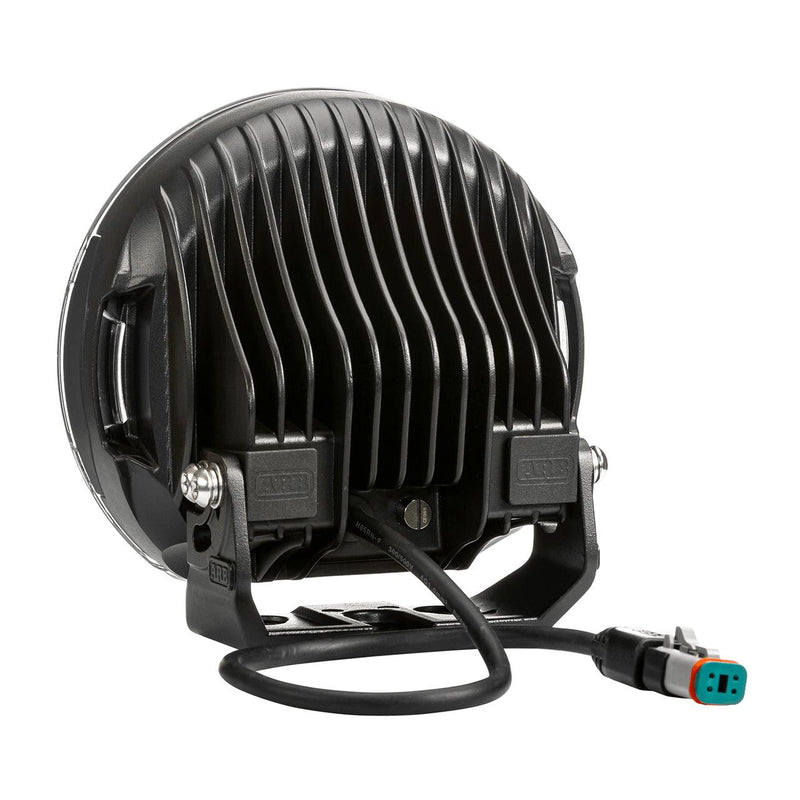 Rear of the ARB Intensity SOLIS LED driving light housing with cooling fins, mounting bracket and connector lead
