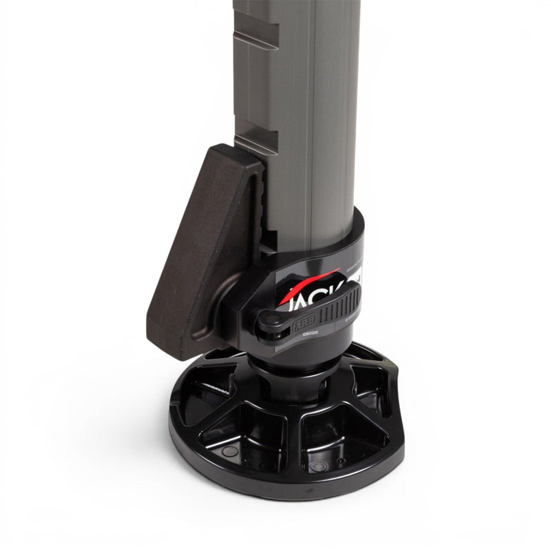 ARB JACK hydraulic long travel recovery jack, aluminium body with the red lowering lever, adjustable foot and carry bag, in use