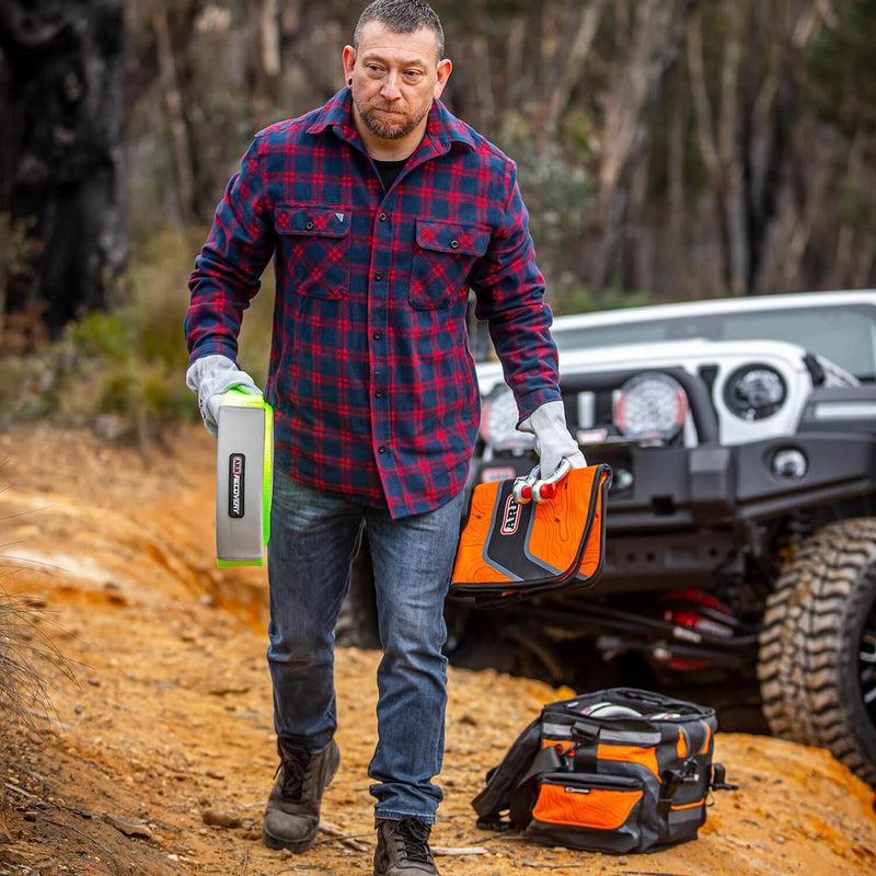 ARB Premium Recovery Kit laid out: large recovery bag with snatch strap, tree trunk protector, winch extension strap, snatch block, shackles and gloves, further view