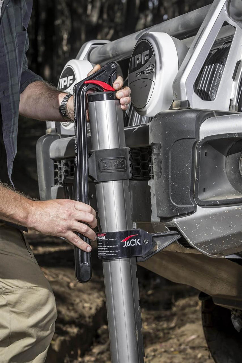 ARB JACK stowed in its mount on a 4x4 bumper