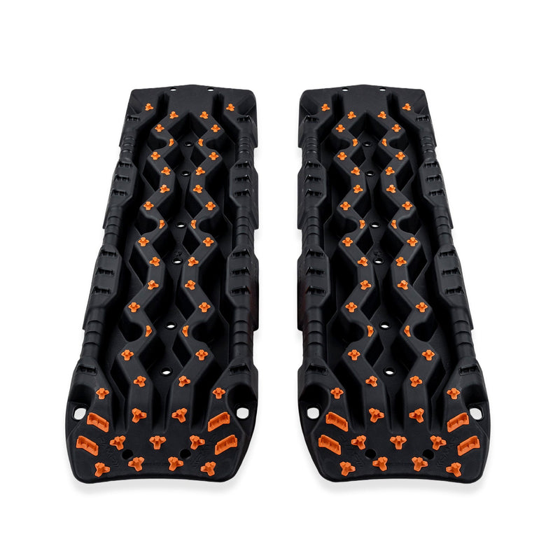 ARB TRED Pro recovery board in black, orange nodules, showing the SIPE-LOCK tooth profile and the shovel end, underside view
