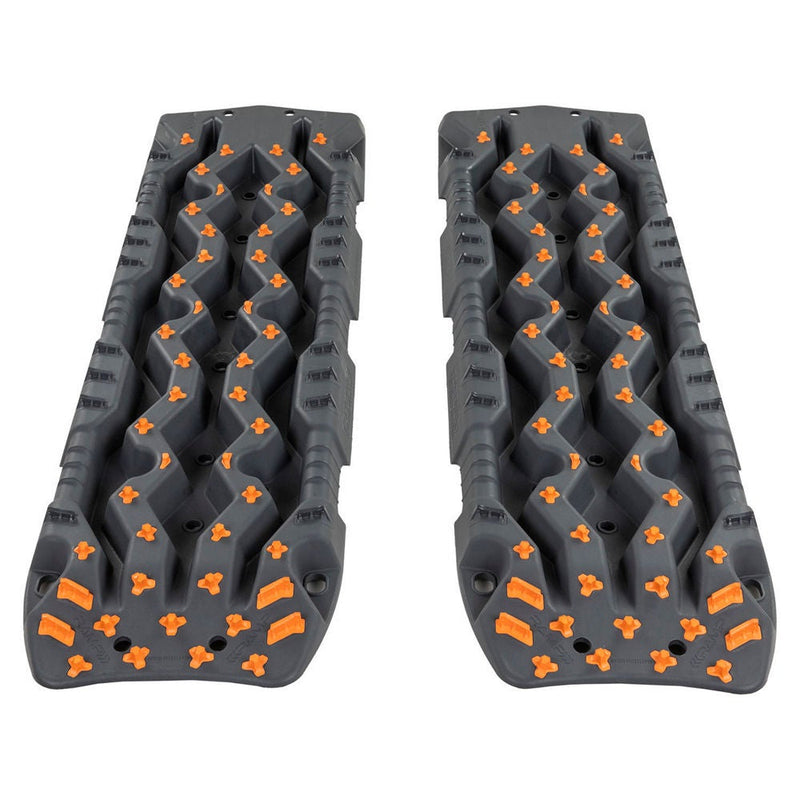 ARB TRED Pro recovery board in monument grey, orange nodules, showing the SIPE-LOCK tooth profile and the shovel end, in use
