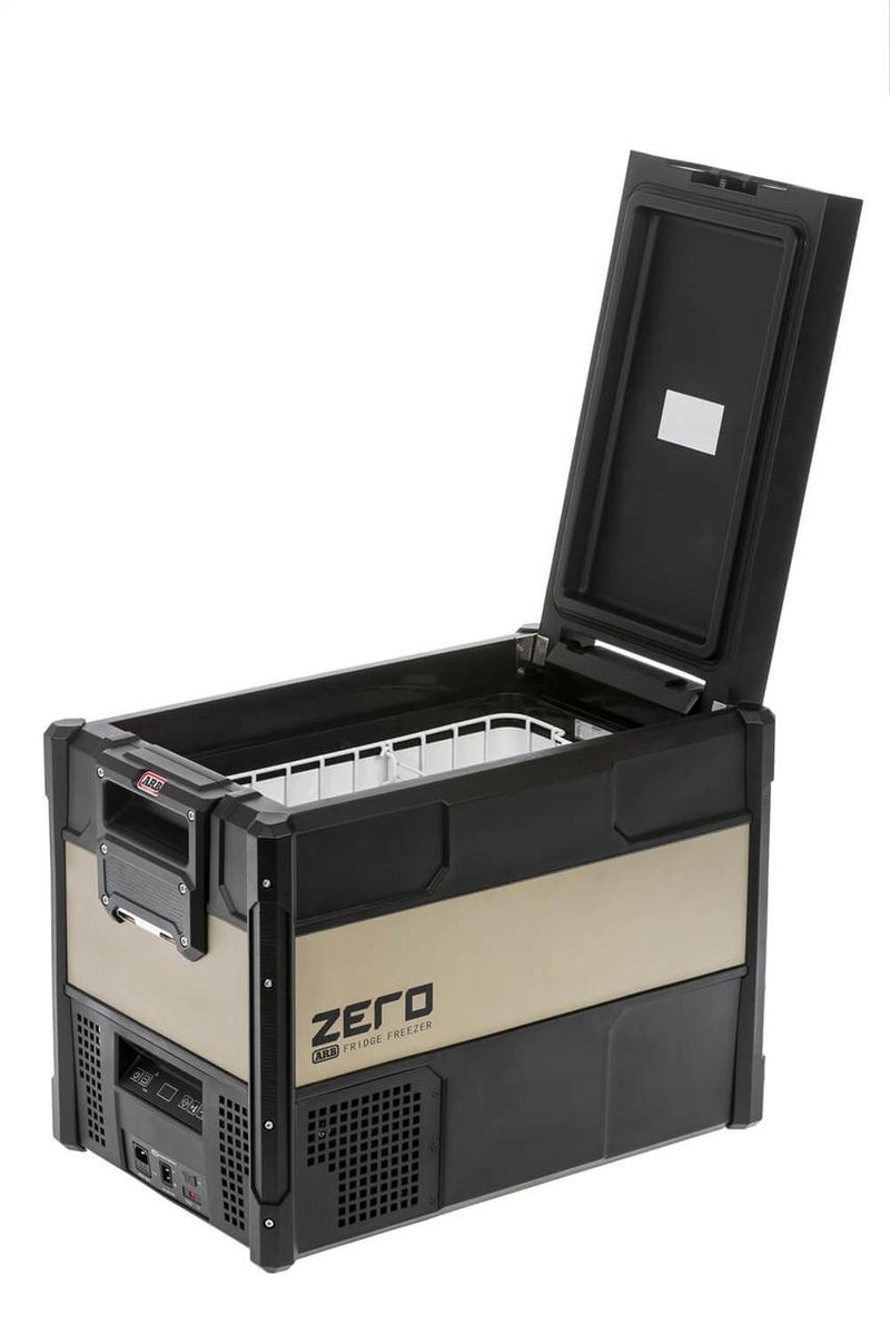 ARB ZERO 47 qt fridge freezer with the quick release lid raised, showing the single cabinet interior and the removable wire basket