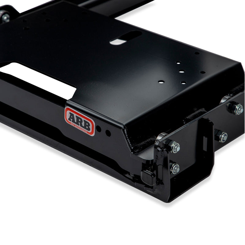 Close detail of the ARB ZERO fridge slide showing the quick release locking catch, roller bearing carriage and the ARB 4x4 Accessories badge on the frame