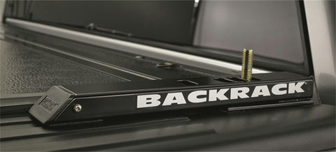 BackRack 2" Riser: black tonneau riser rail lettered BACKRACK on a truck bed rail over a tonneau cover