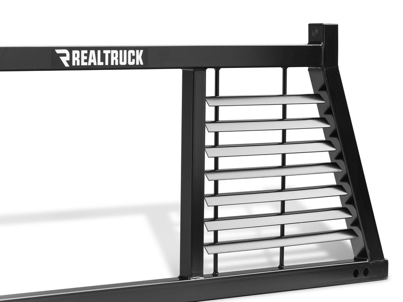 BackRack Half Louvered: close crop of one louvered side of a black half louvered rack with a RealTruck decal on the top bar