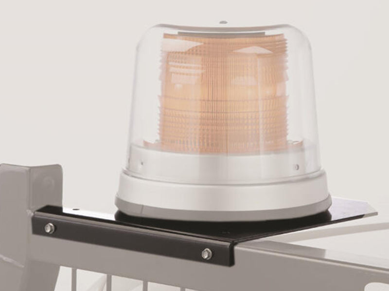 BackRack Light Brackets: A black steel light bracket holds an amber beacon on the corner of a ghosted headache rack
