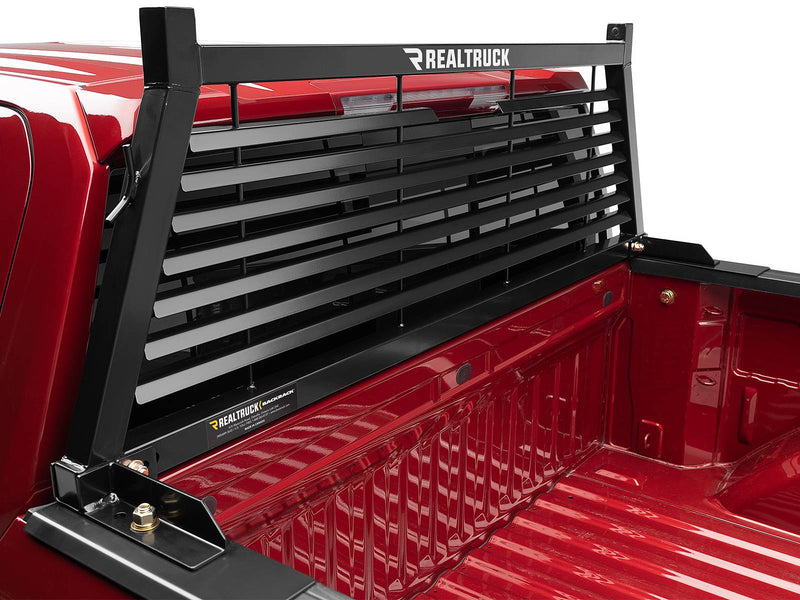 BackRack Louvered: A black louvered headache rack is mounted at the front of a red pickup bed