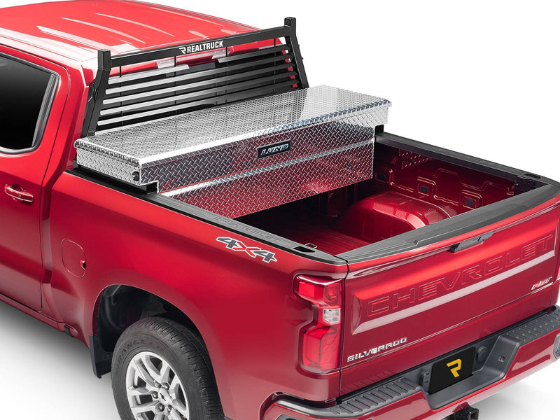 BackRack Louvered: A black louvered headache rack stands behind a diamond plate toolbox on a red pickup