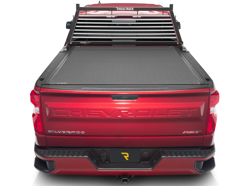 BackRack Louvered: rear view of a red Chevrolet Silverado with a black louvered headache rack behind a closed tonneau cover