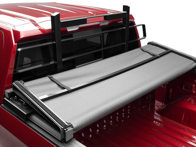 BackRack Original: black Original headache rack behind a red pickup cab with a folding soft tonneau cover partly open
