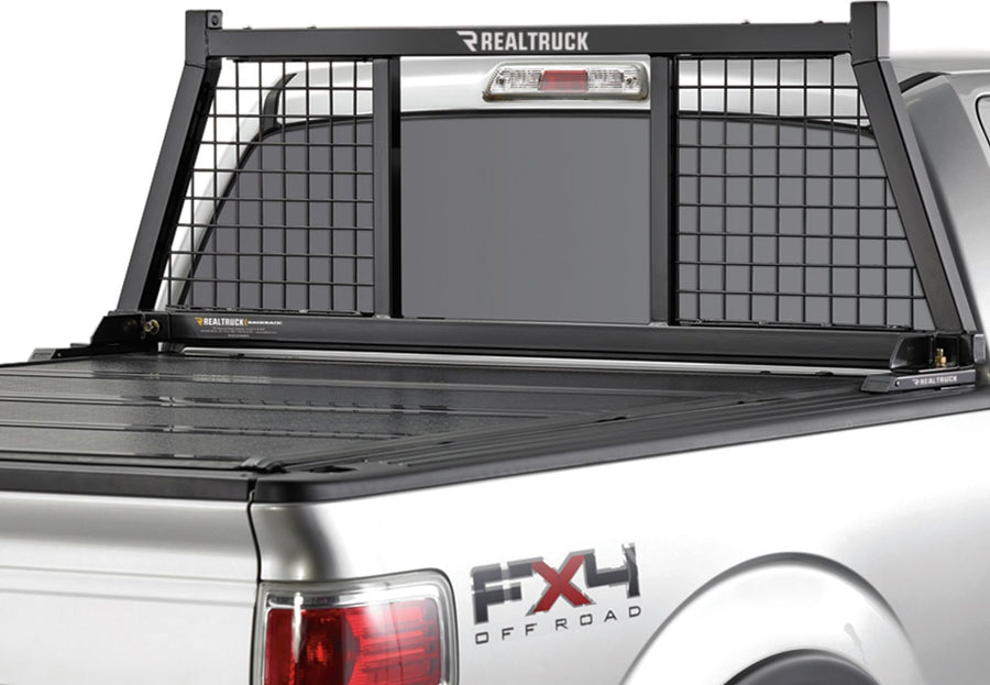 BackRack Half Safety Headache Rack: Black half safety headache rack with mesh outer panels on a silver pickup with a hard folding tonneau cover.