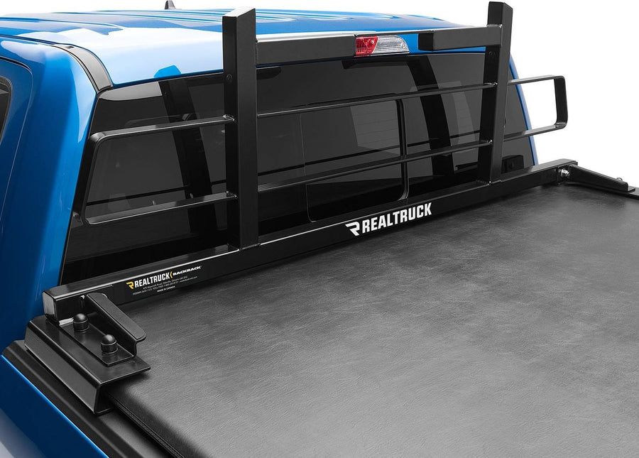 BackRack Original Headache Rack: Black Original headache rack mounted behind the cab of a blue pickup over a black soft tonneau cover.