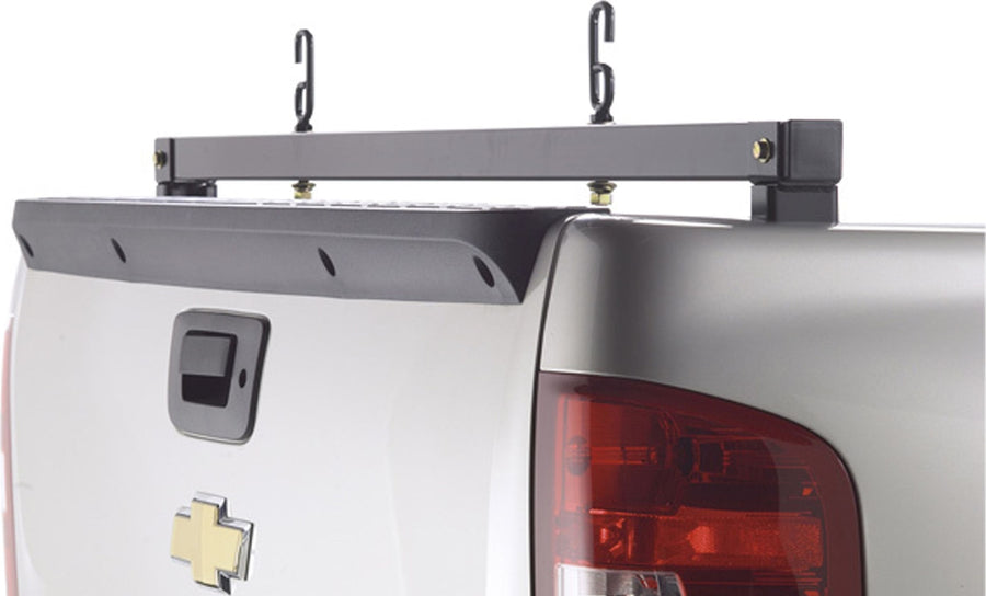 BackRack Rear Bar: Black rear ladder bar with two J hooks mounted across the rear of a silver pickup bed.