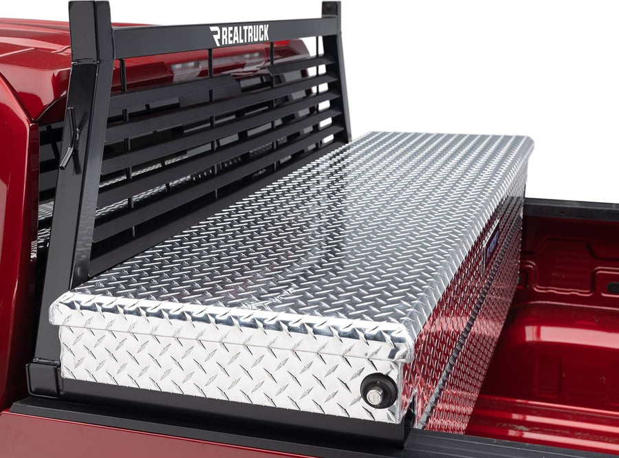 BackRack Louvered Headache Rack: A black louvered headache rack rises behind a diamond plate toolbox in a red pickup bed.