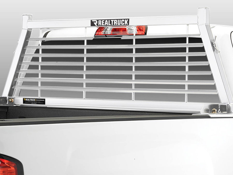BackRack Louvered Headache Rack: A white louvered headache rack is installed behind the cab of a white pickup.