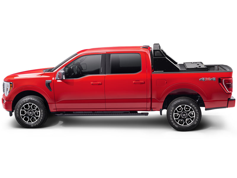 BackRack Trace Rack: side profile of a red Ford F-150 crew cab with a black Trace Rack behind the cab and a tonneau cover