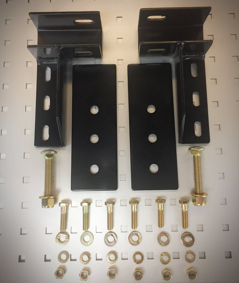 BackRack Utility Body: black utility body mounting brackets, slotted plates, bolts, washers and nuts laid out on a pegboard