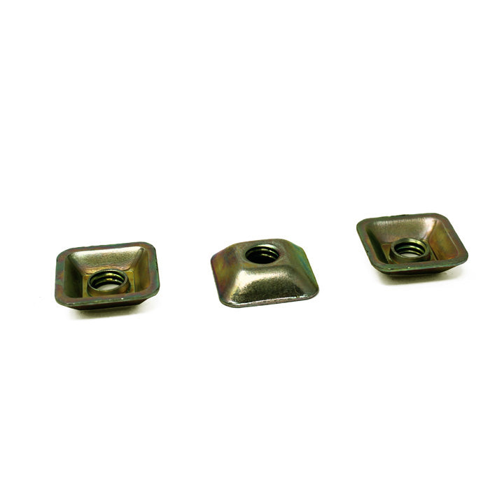 Close-up of the Baja Designs 3/8" Tamperproof Security Hardware Kit: three square threaded clip nuts on a white background
