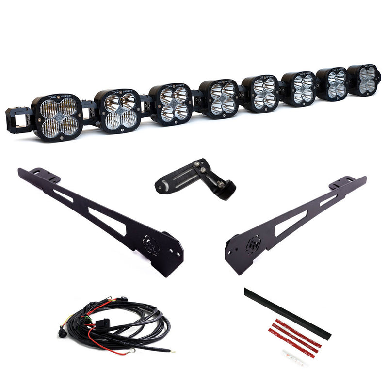 Baja Designs 8XL Linkable Roof Kit, complete kit on a studio background: eight linked XL pods with two long black roof brackets, a center bracket, relay harness and trim strips on white