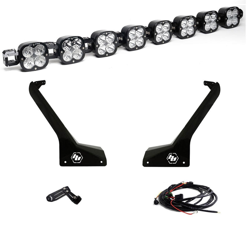 Baja Designs 8XL Linkable Roof Mount Light Kit, complete kit on a studio background: an eight-pod linkable LED roof bar with two black Jeep A-pillar brackets, a center mount and a wiring harness on white