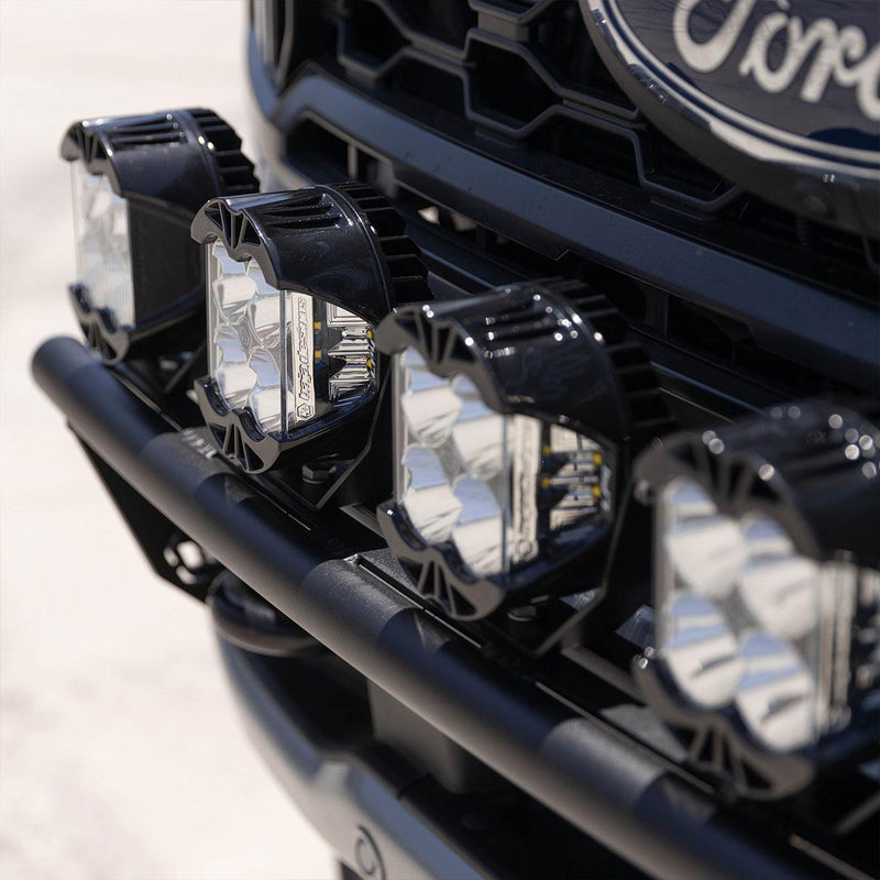 Baja Designs Bull Bar Light Kit on a Ford: square LED pods lined up on a black bull bar in front of a Ford grille