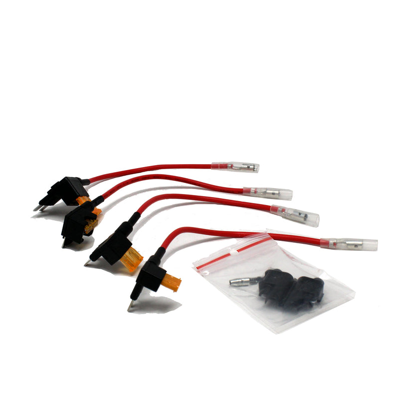 Baja Designs Fuse Tap Kit, complete kit on a studio background: four fuse taps with red power leads and bullet terminals beside a small bag of splice connectors